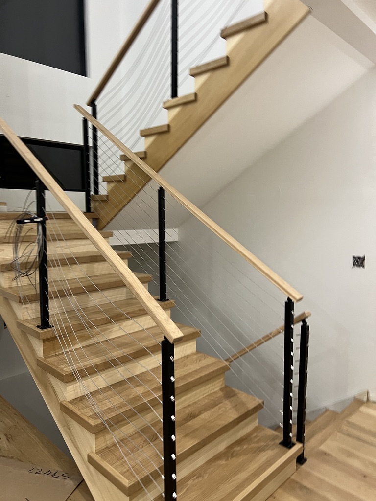 Large double stair cable railing system.
